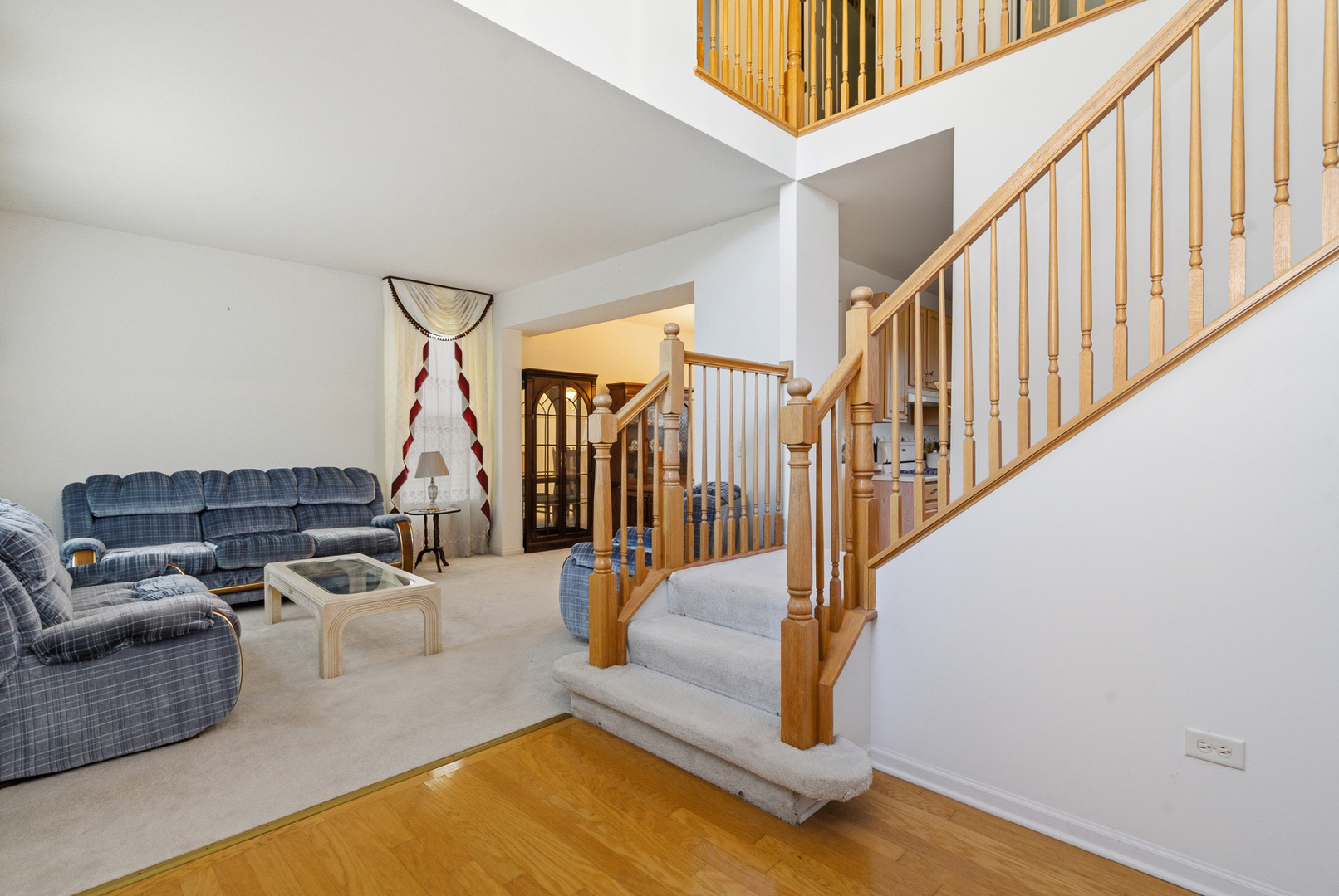100 Sycamore Drive Bolingbrook, IL 60490 - Photo 13 of 42 a living room with furniture floor and stairs