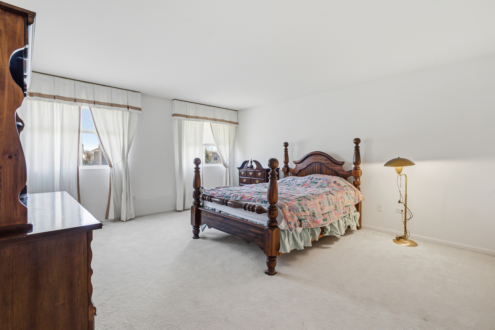 100 Sycamore Drive Bolingbrook, IL 60490 - Photo 18 of 42 a bedroom with a bed and wooden floor