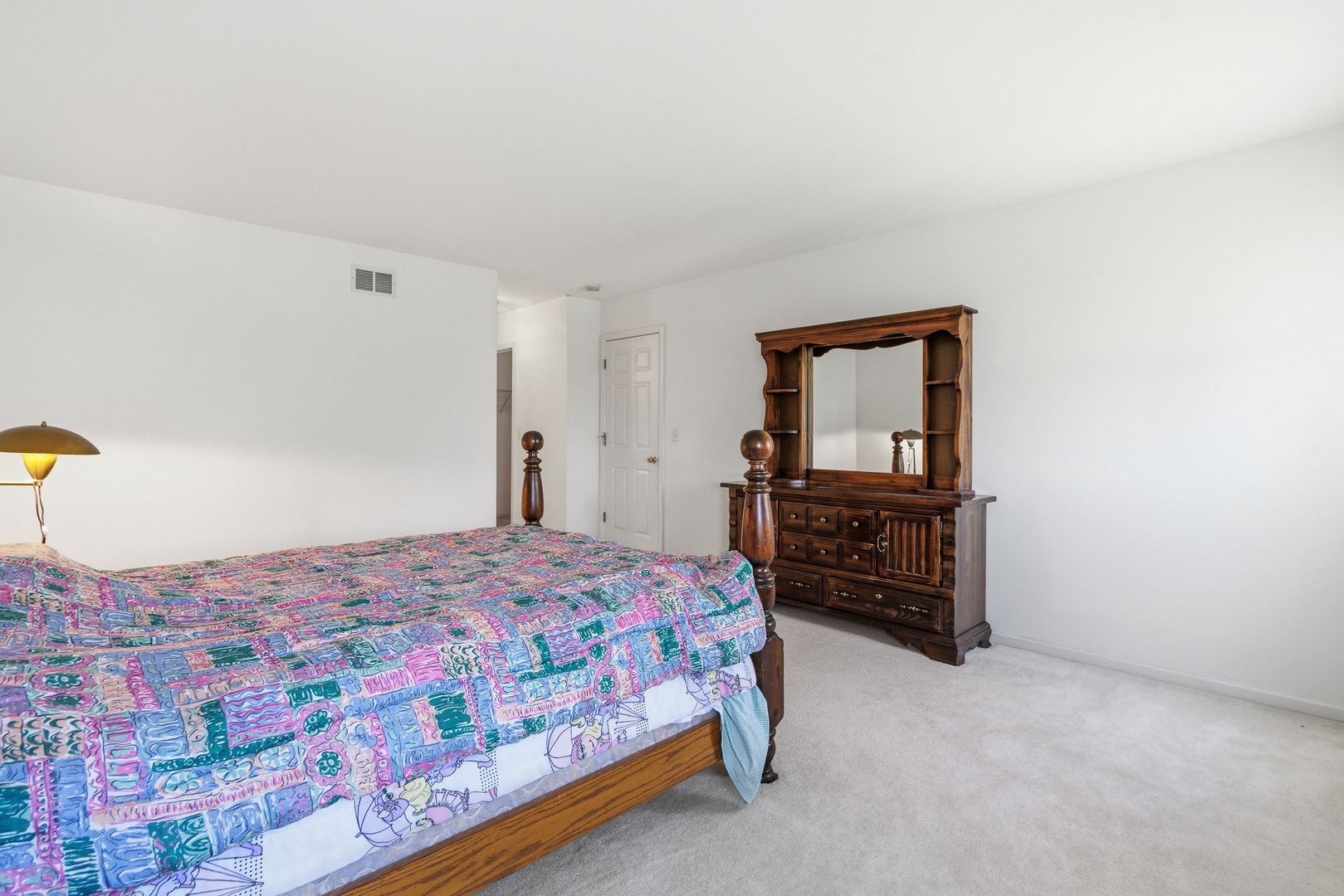 100 Sycamore Drive Bolingbrook, IL 60490 - Photo 19 of 42 a bedroom with a bed and dresser