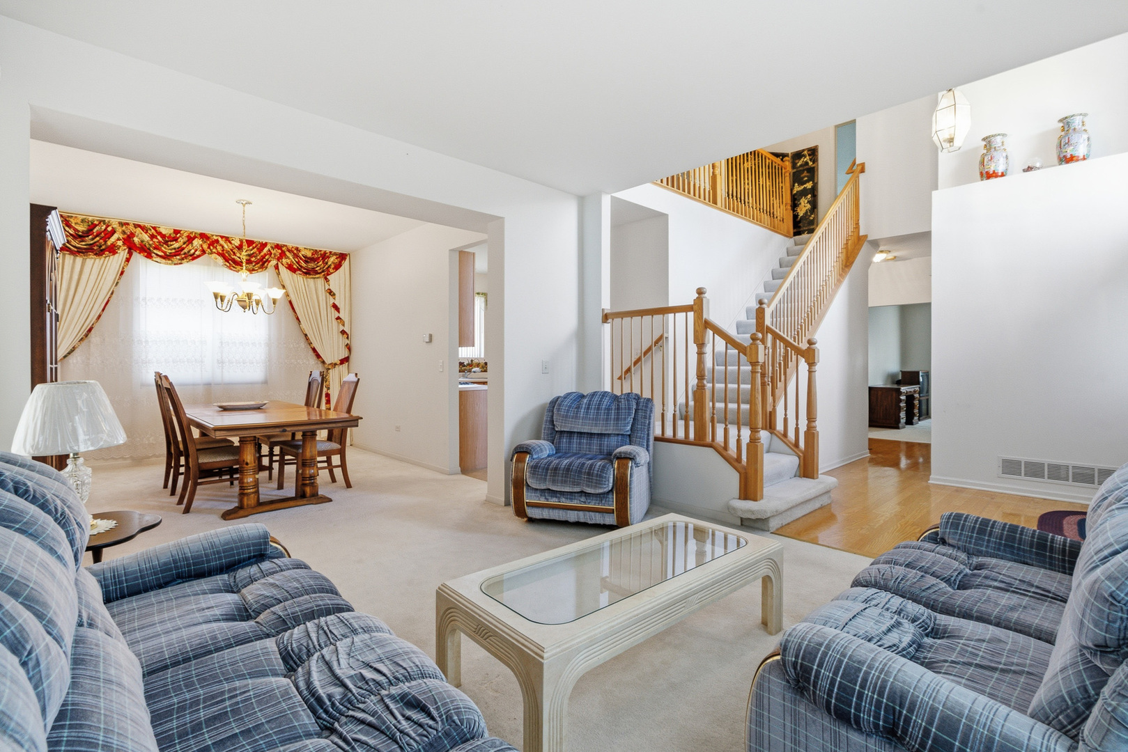 100 Sycamore Drive Bolingbrook, IL 60490 - Photo 2 of 42 a living room with furniture and a large window