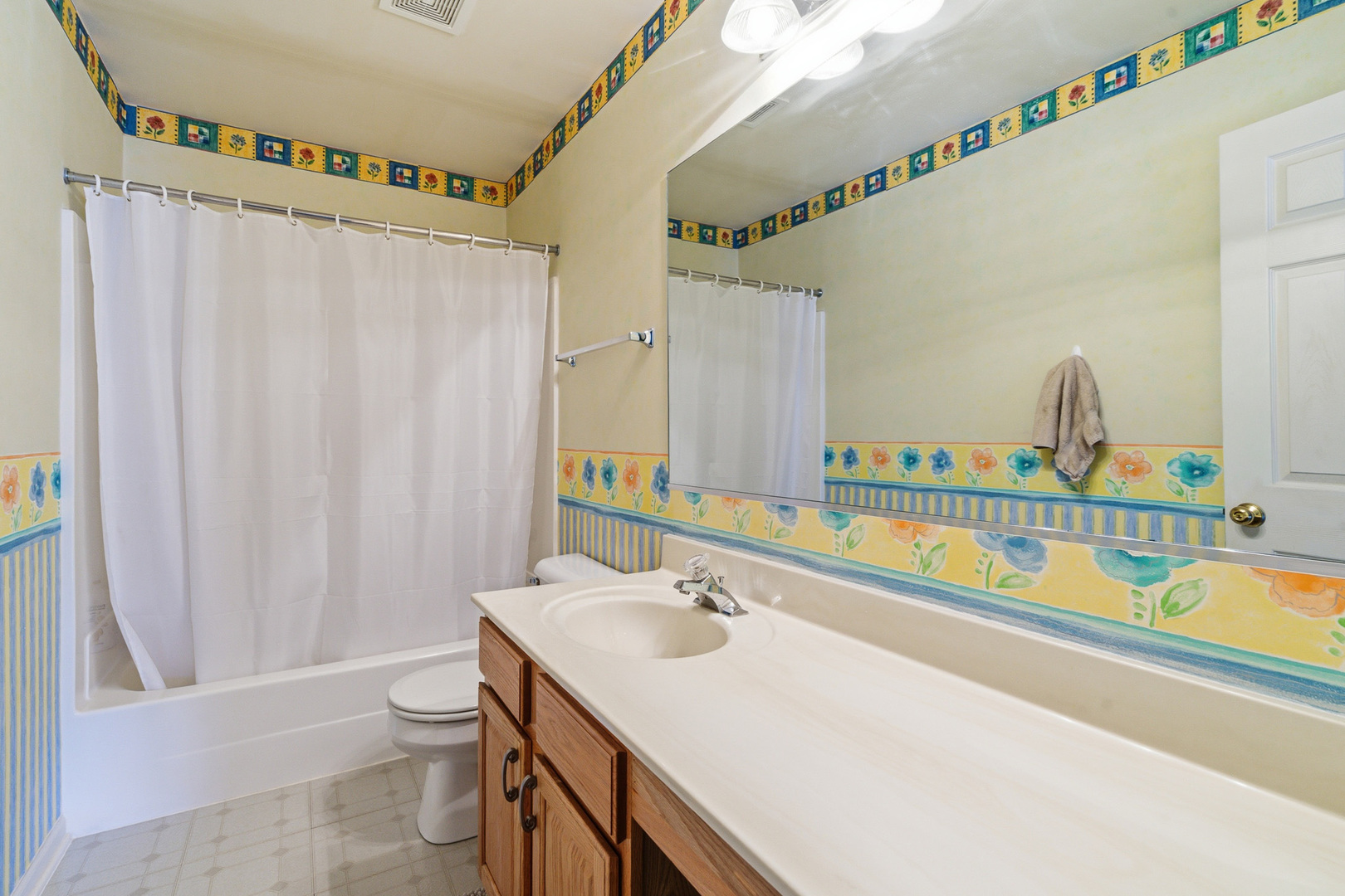 100 Sycamore Drive Bolingbrook, IL 60490 - Photo 23 of 42 a bathroom with a sink and a mirror