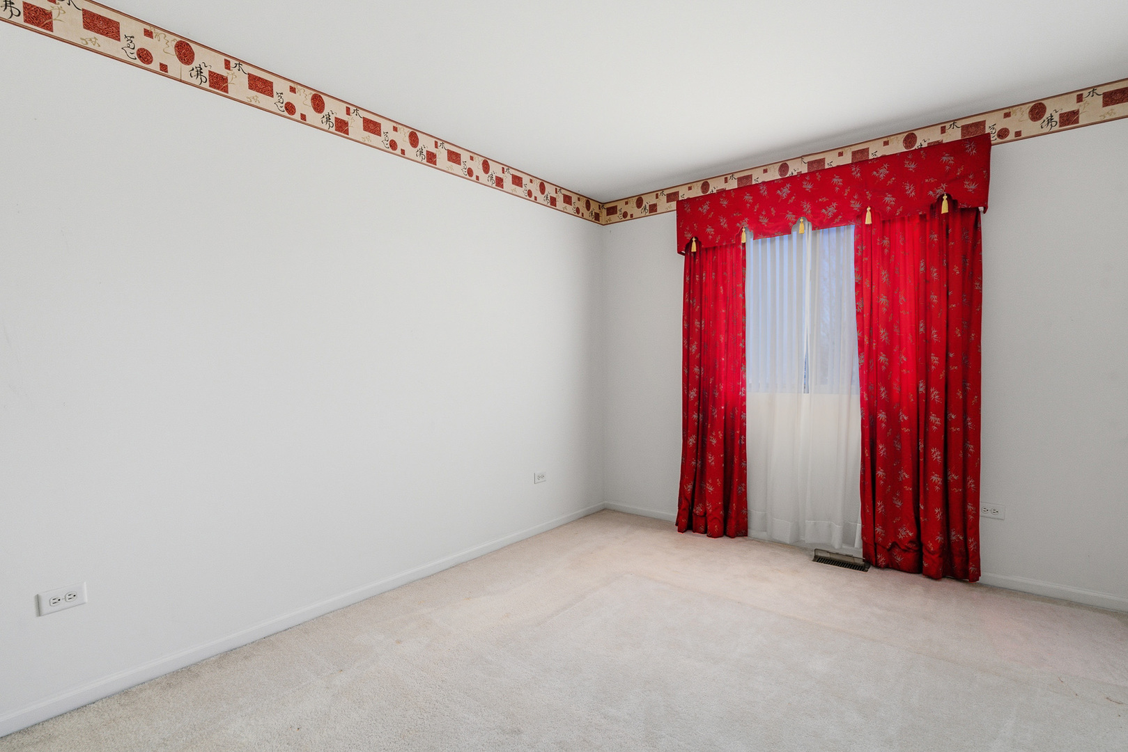 100 Sycamore Drive Bolingbrook, IL 60490 - Photo 24 of 42 a view of a room with red walls and a window