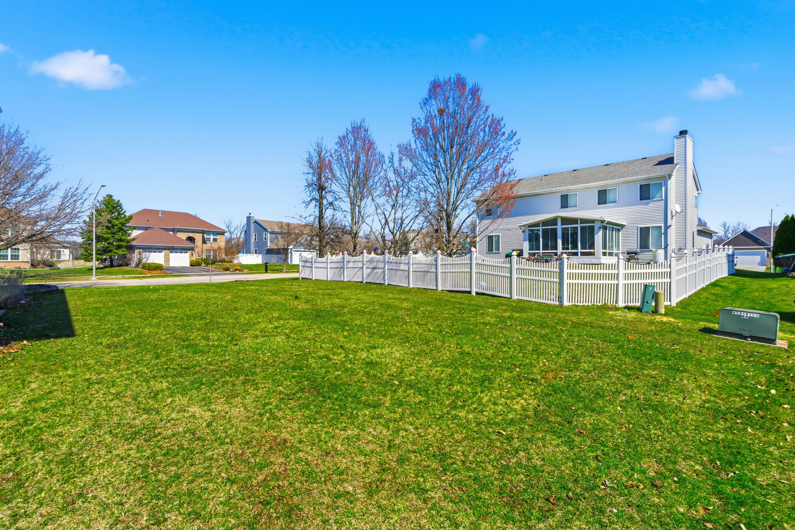 100 Sycamore Drive Bolingbrook, IL 60490 - Photo 33 of 42 a view of a house with a yard porch and sitting area