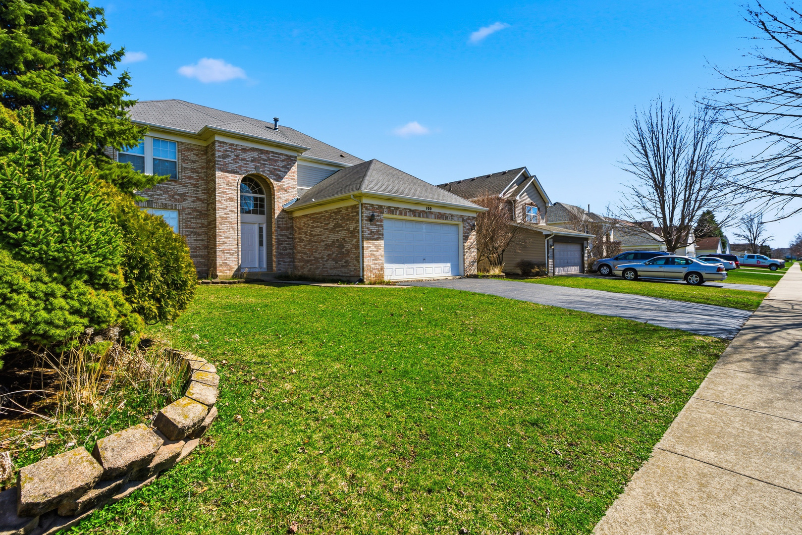 100 Sycamore Drive Bolingbrook, IL 60490 - Photo 40 of 42 a front view of house with garden