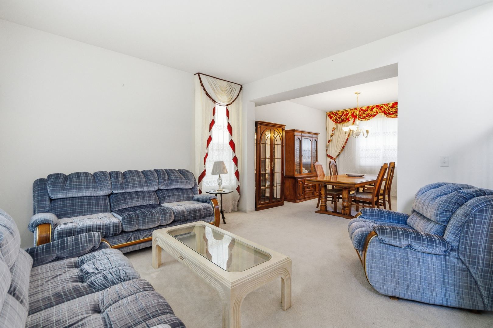 100 Sycamore Drive Bolingbrook, IL 60490 - Photo 4 of 42 a living room with furniture and a gym