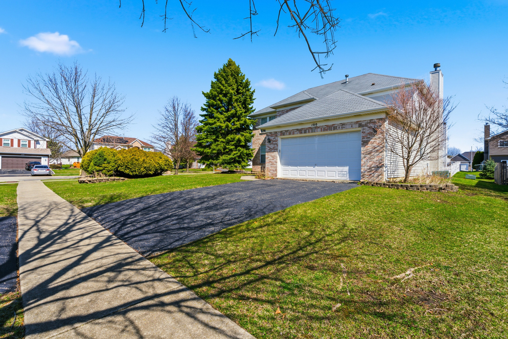 100 Sycamore Drive Bolingbrook, IL 60490 - Photo 42 of 42 a front view of a house with garden