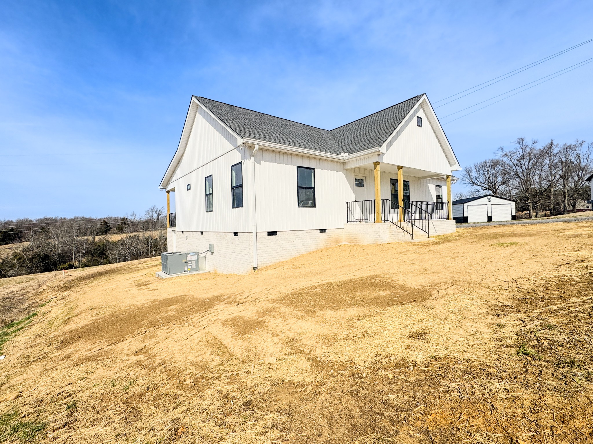 575 Pleasant Hill Road Lafayette, TN 37083 - Photo 31 of 51 a view of a house with a yard
