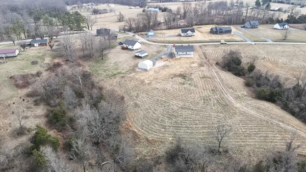 a view of backyard of a house