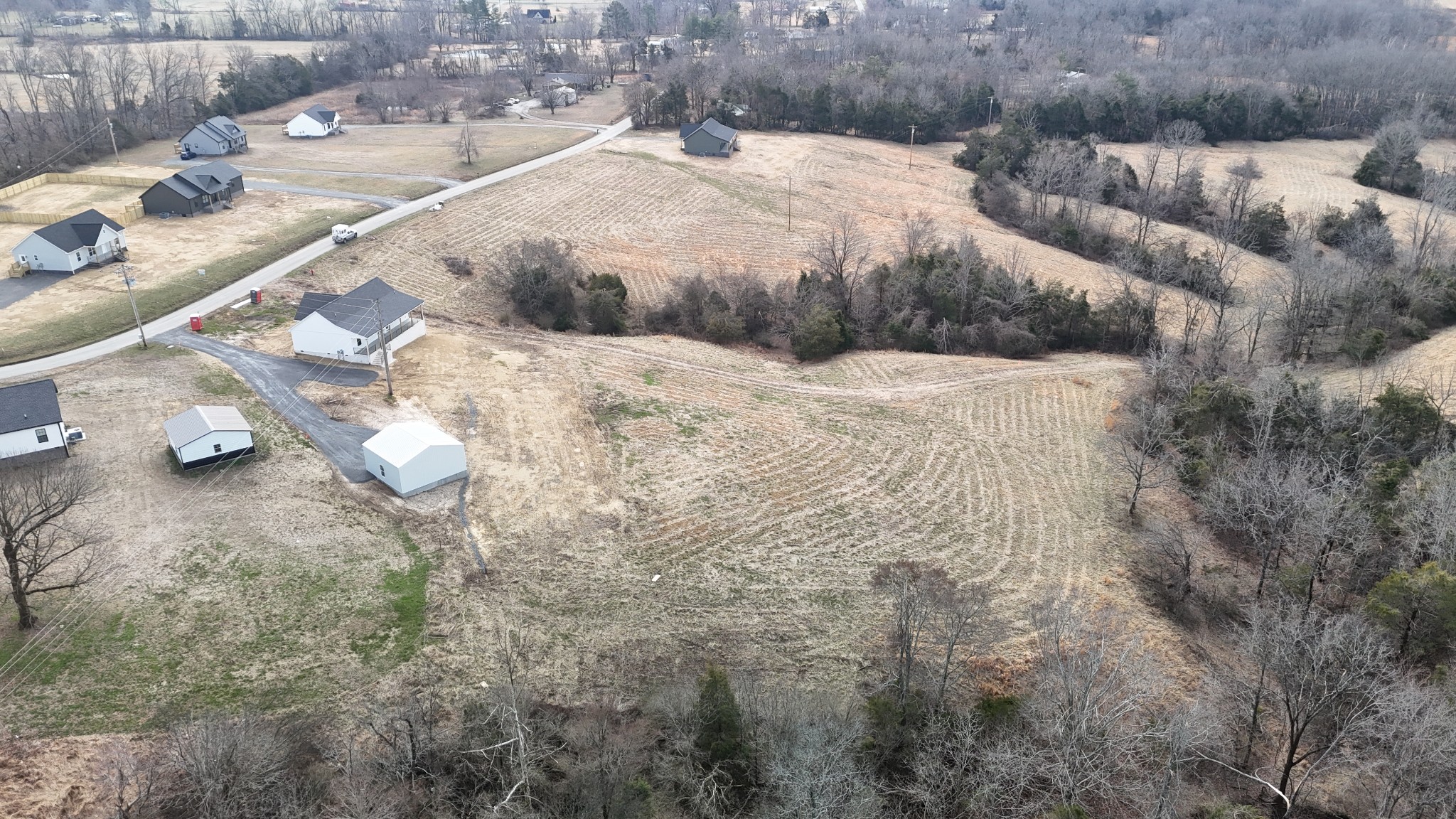 575 Pleasant Hill Road Lafayette, TN 37083 - Photo 45 of 51 a view of multiple house with backyard