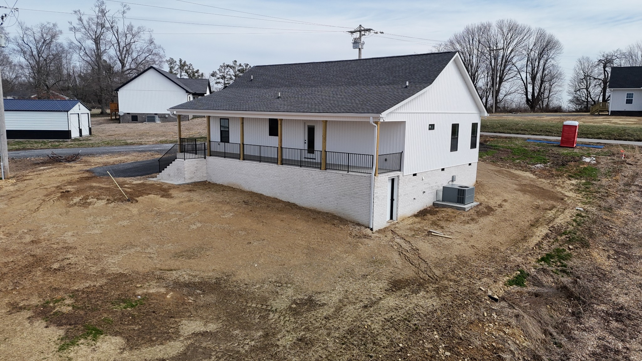 575 Pleasant Hill Road Lafayette, TN 37083 - Photo 51 of 51 a front view of a house with a yard