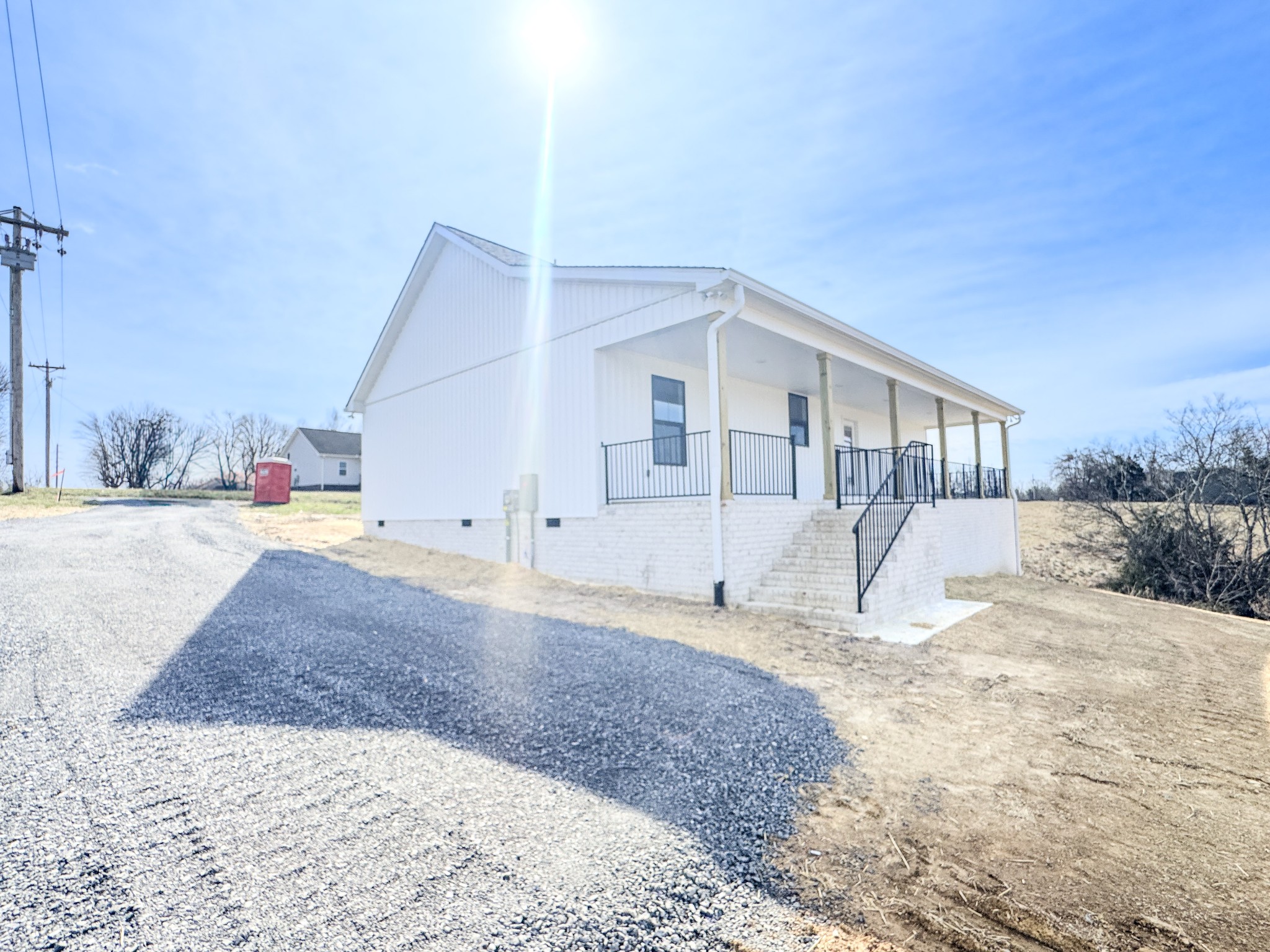 575 Pleasant Hill Road Lafayette, TN 37083 - Photo 7 of 51 a view of a house with a yard