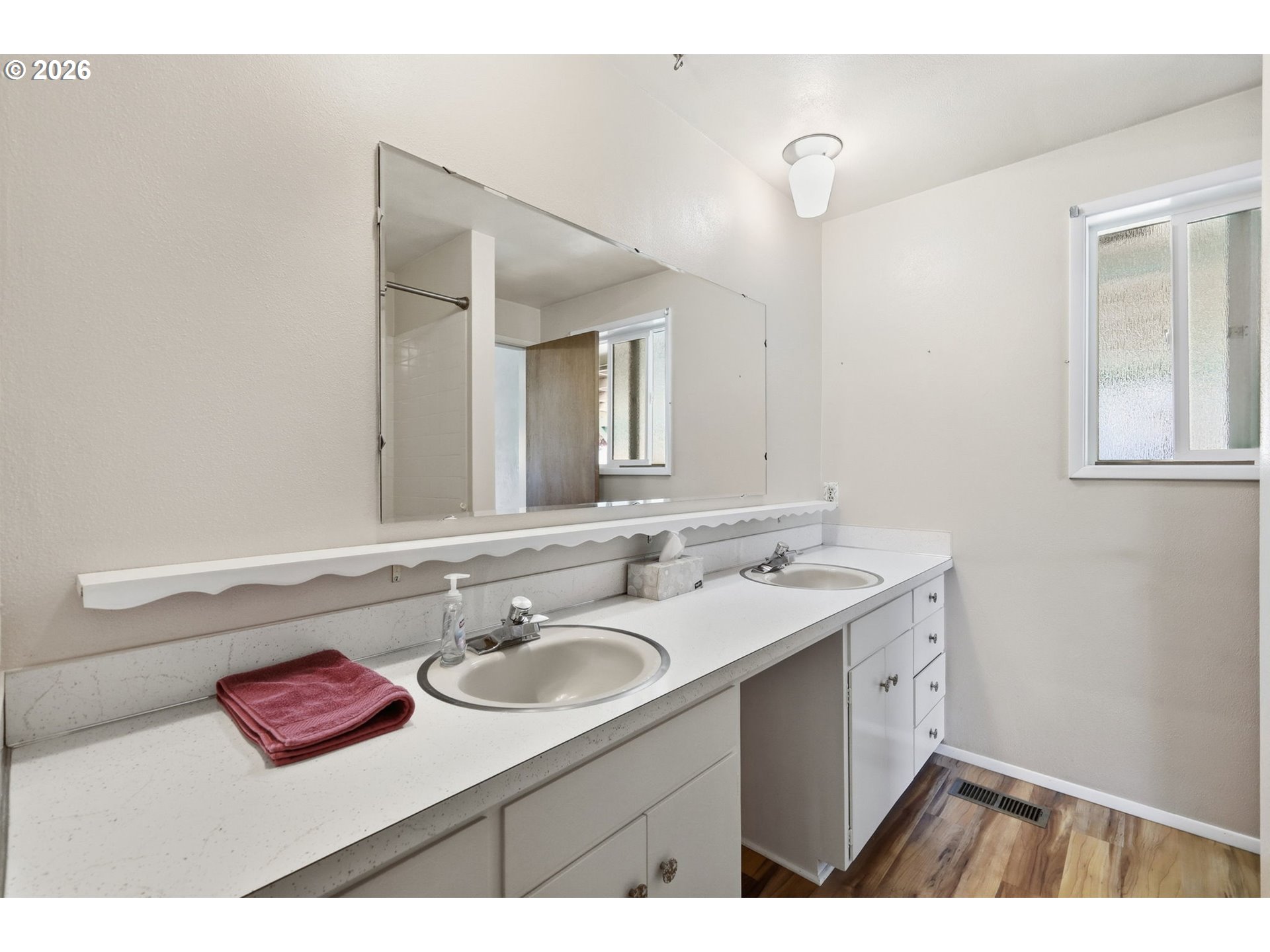 2494 38th Street Springfield, OR 97477 - Photo 16 of 38 a bathroom with a sink and a mirror