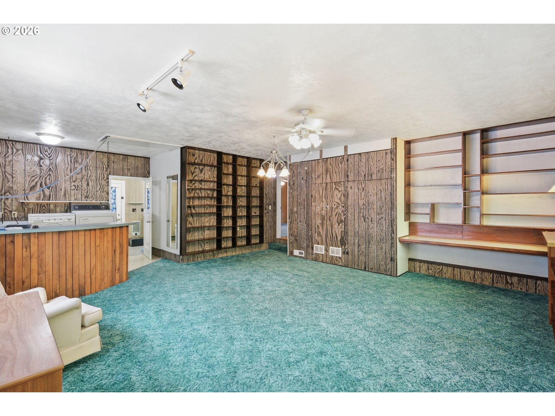 2494 38th Street Springfield, OR 97477 - Photo 24 of 38 a view of a room with stairs and a wooden floor