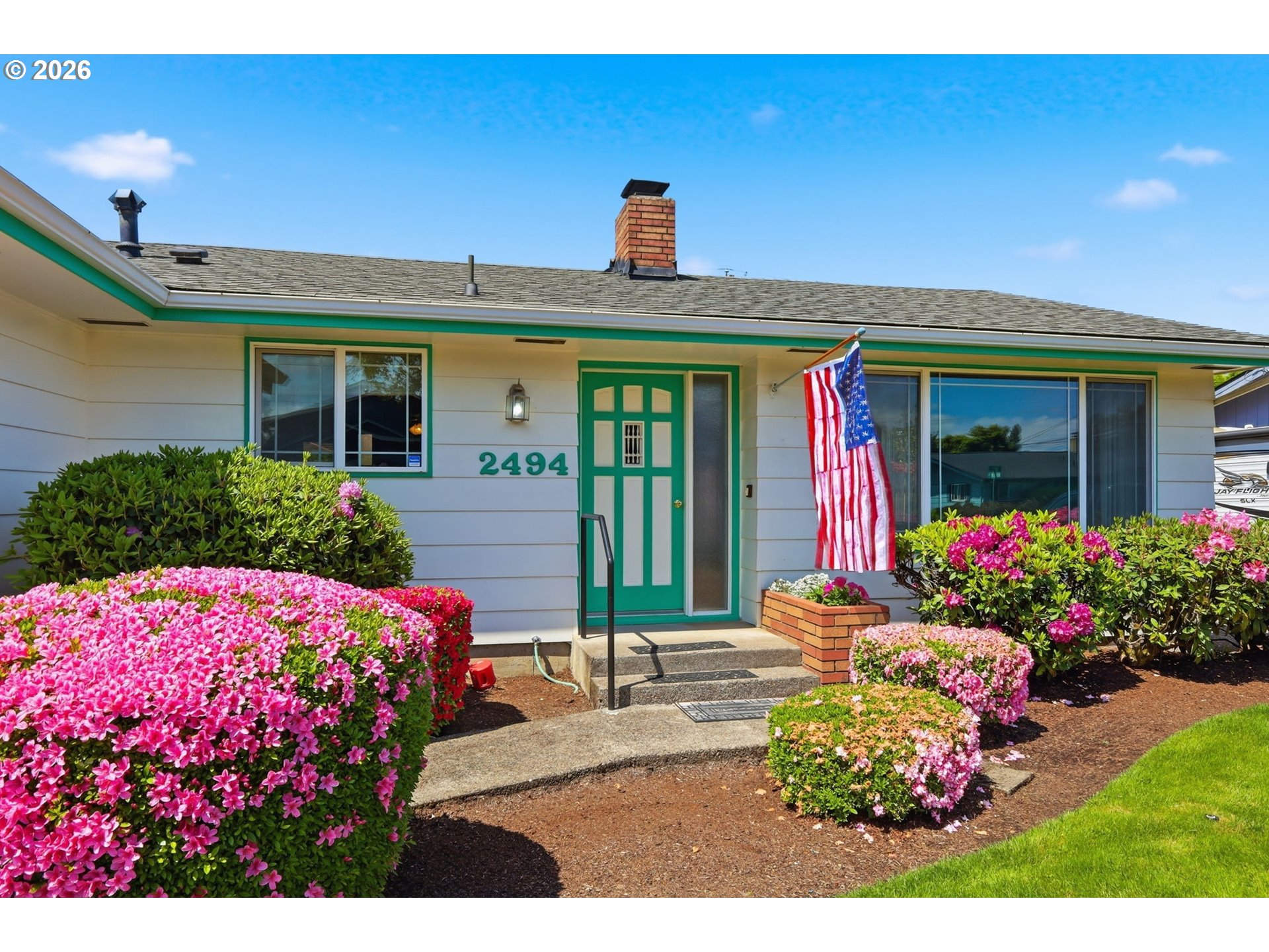 2494 38th Street Springfield, OR 97477 - Photo 3 of 38 a front view of a house with a yard