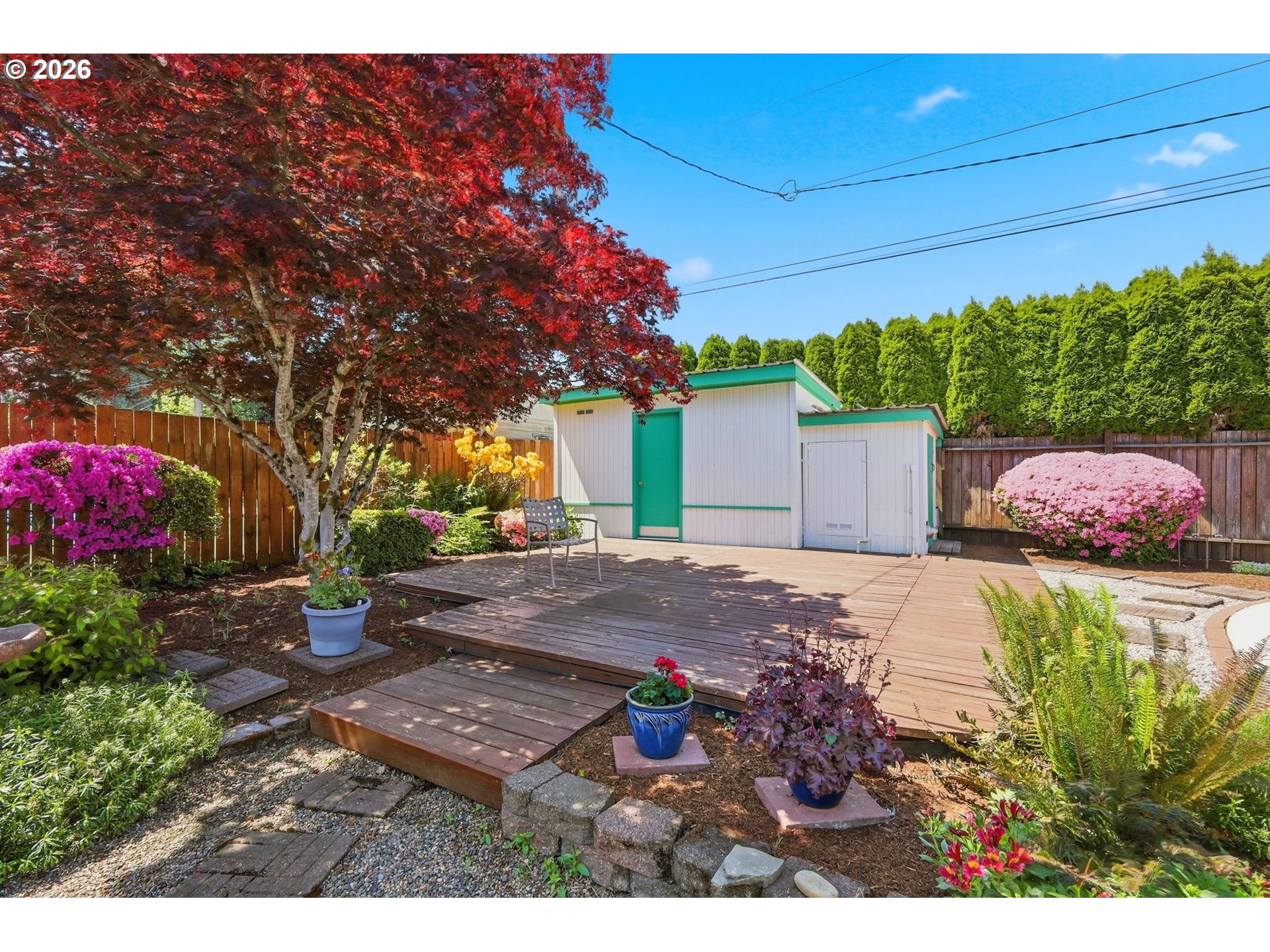 2494 38th Street Springfield, OR 97477 - Photo 33 of 38 a view of a backyard with potted plants