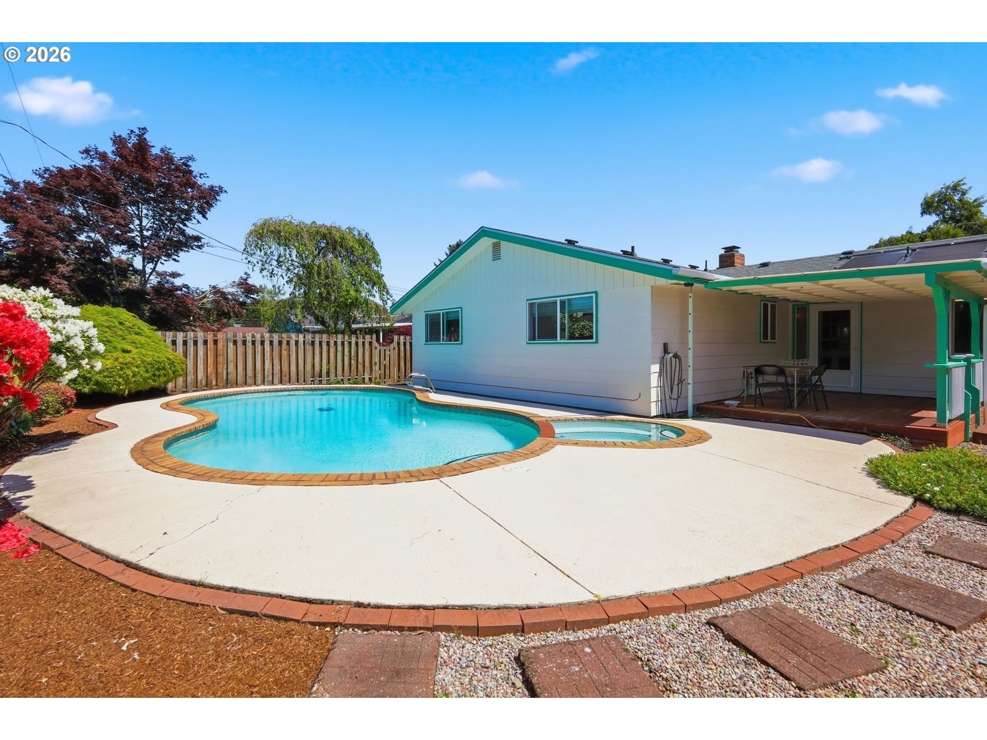 2494 38th Street Springfield, OR 97477 - Photo 35 of 38 a view of a house with a swimming pool