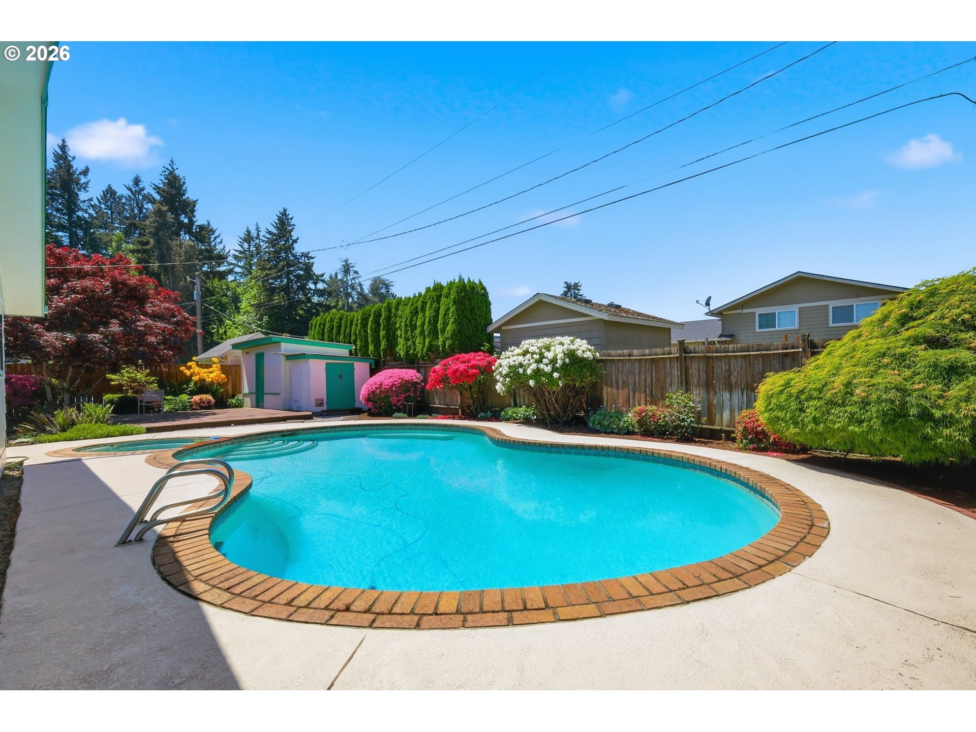 2494 38th Street Springfield, OR 97477 - Photo 36 of 38 a view of a swimming pool with a yard