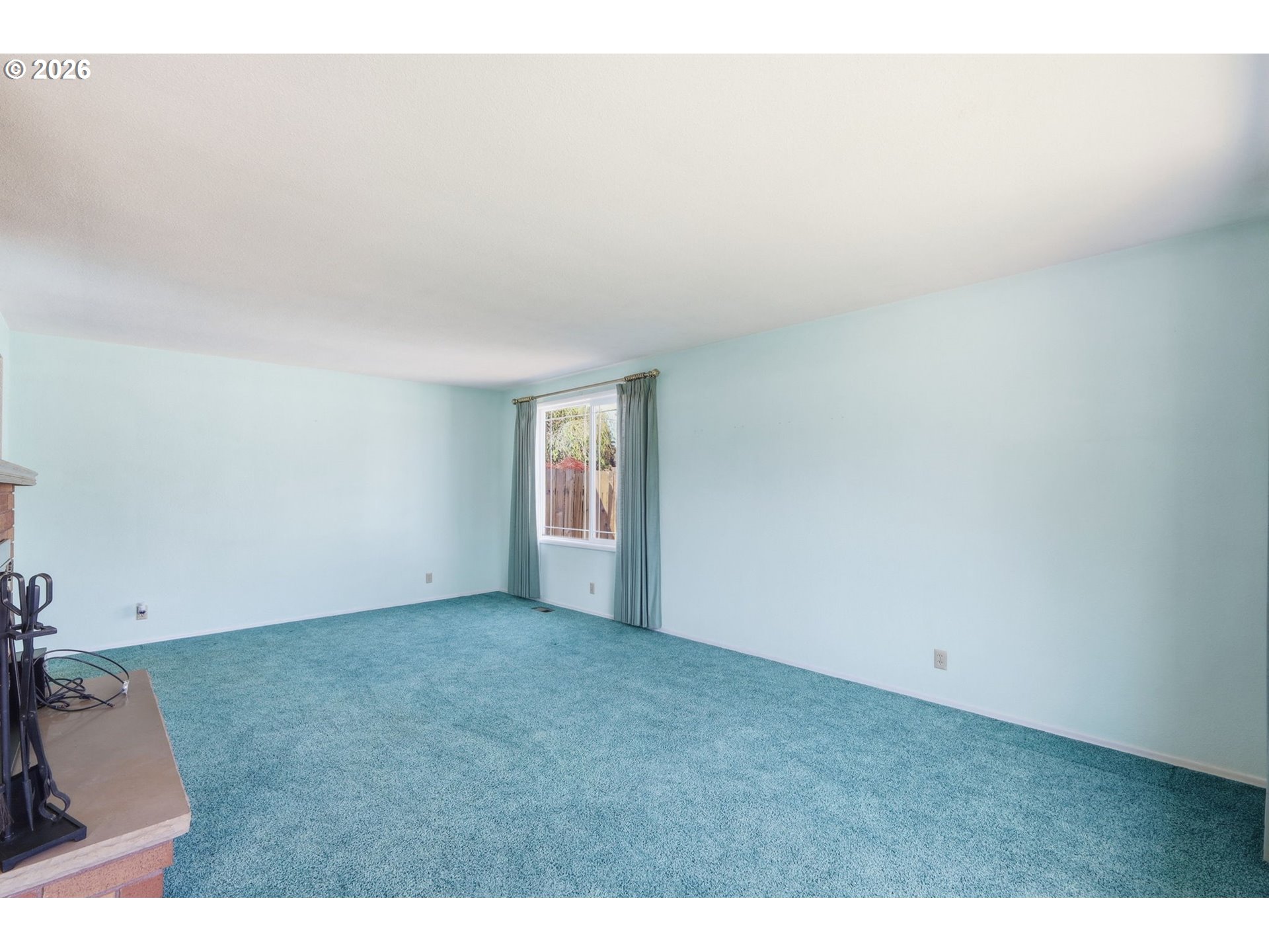 2494 38th Street Springfield, OR 97477 - Photo 5 of 38 a view of an empty room and window