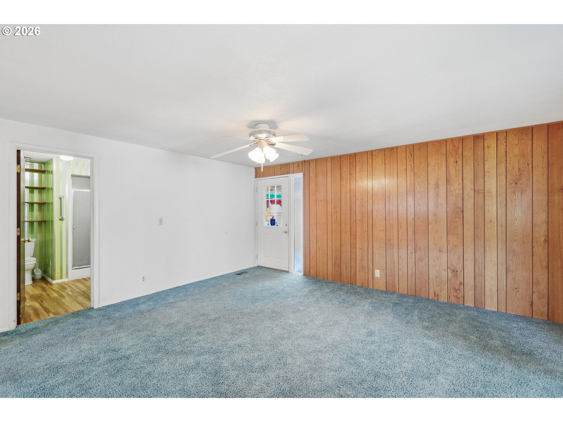 2494 38th Street Springfield, OR 97477 - Photo 8 of 38 a view of an empty room with wooden floor