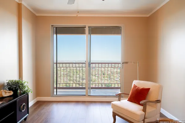 a living room with furniture and a window