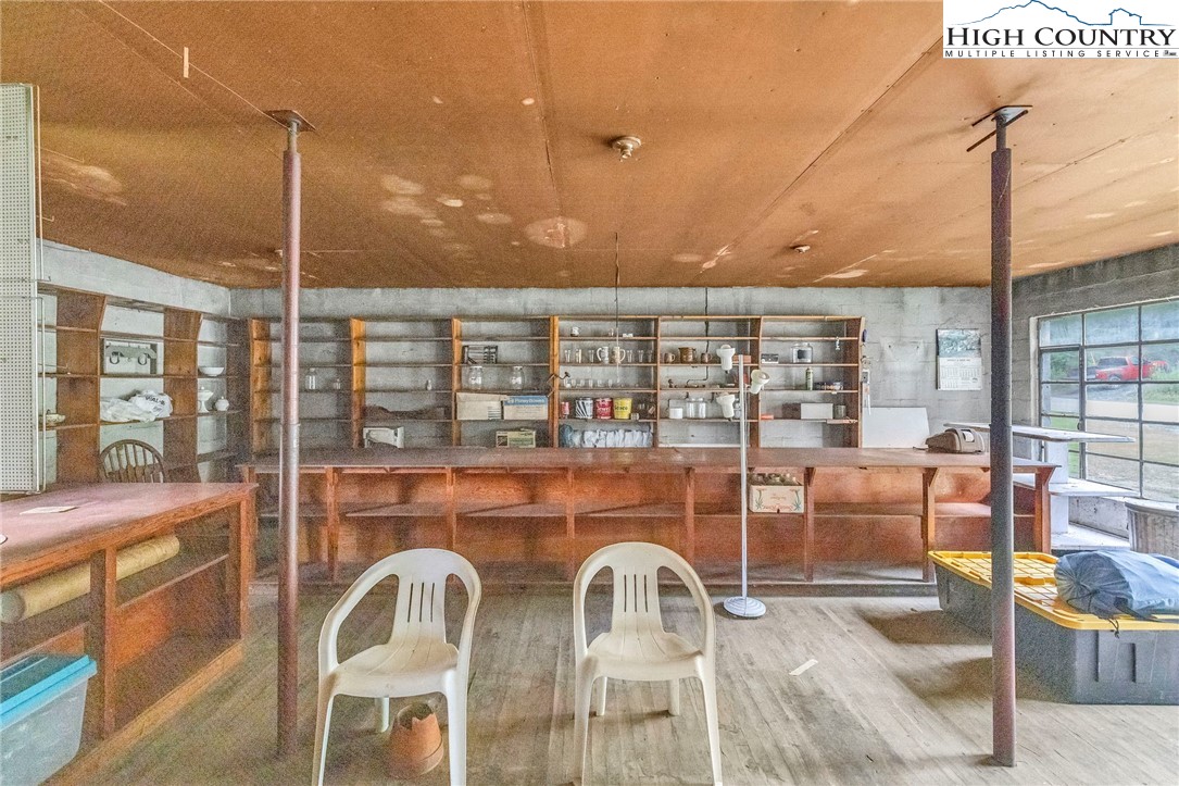 949 Coy Ham Road Lansing, NC 28643 - Photo 40 of 48 a view of a dining room with furniture