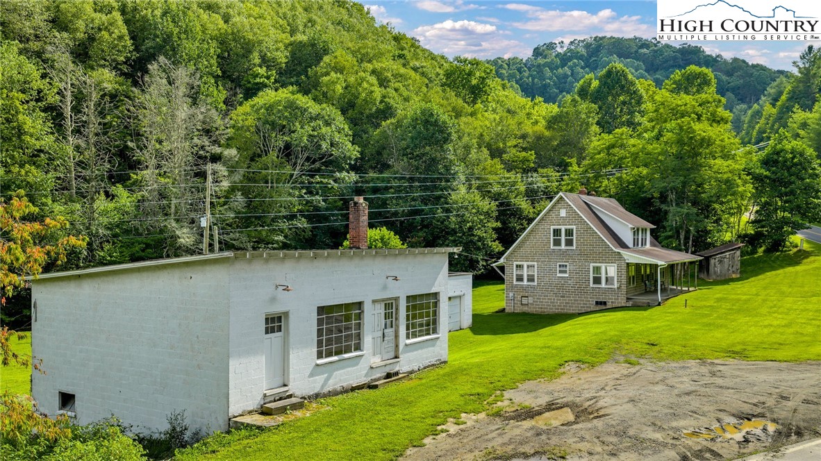 949 Coy Ham Road Lansing, NC 28643 - Photo 46 of 48 a front view of a house with garden