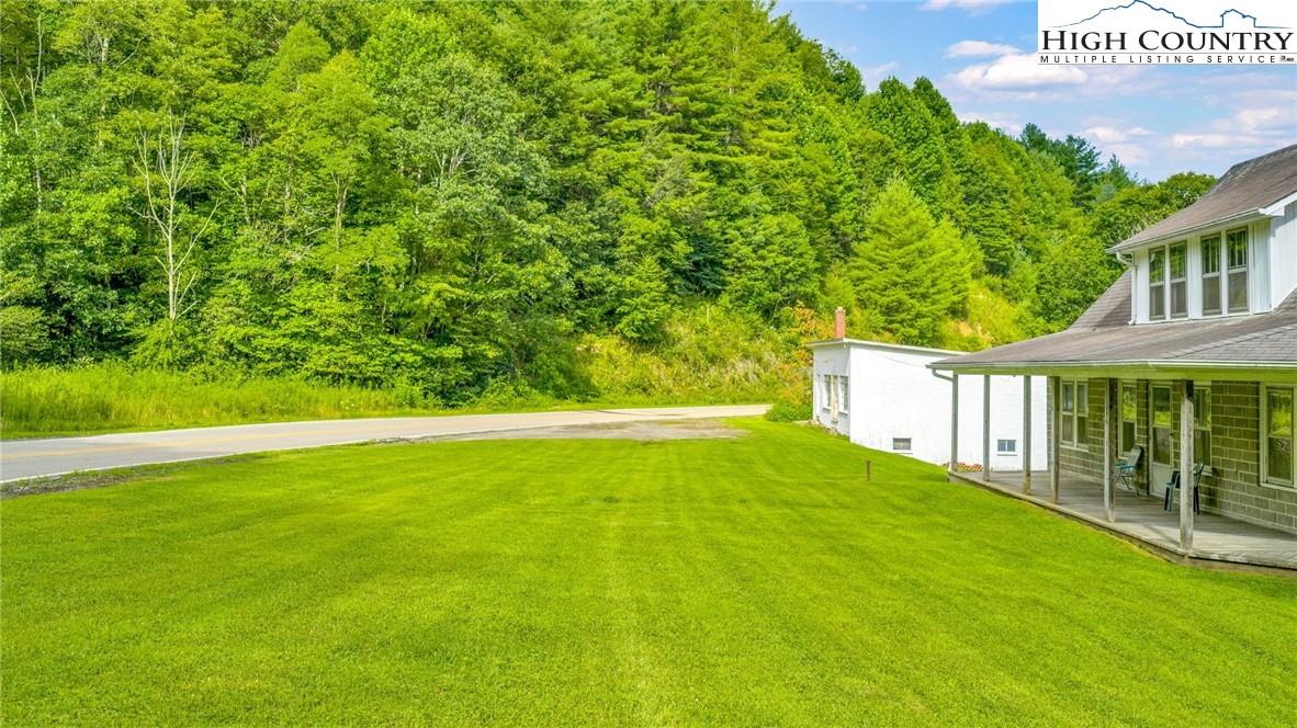 949 Coy Ham Road Lansing, NC 28643 - Photo 7 of 48 a view of an outdoor space and deck view