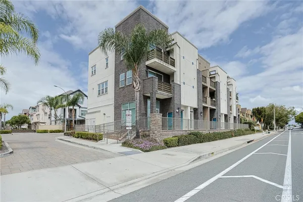 a front view of a building with street view