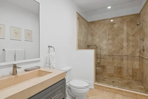 a view of an house with backyard and a garden