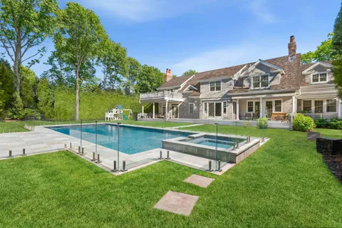 a view of a park with large trees