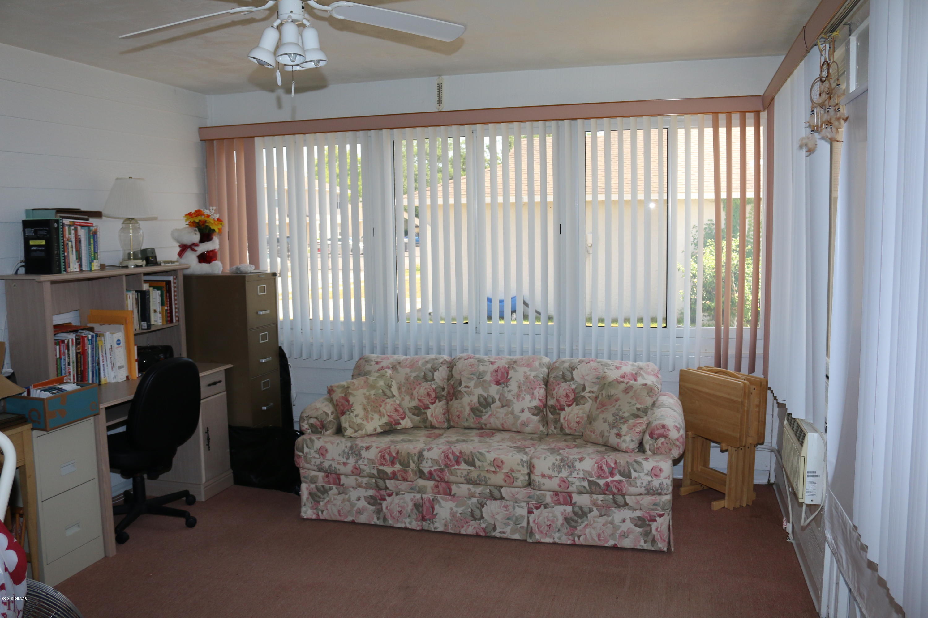 987 Deer Springs Road Port Orange, FL 32129 - Photo 24 of 34 Closed in porch