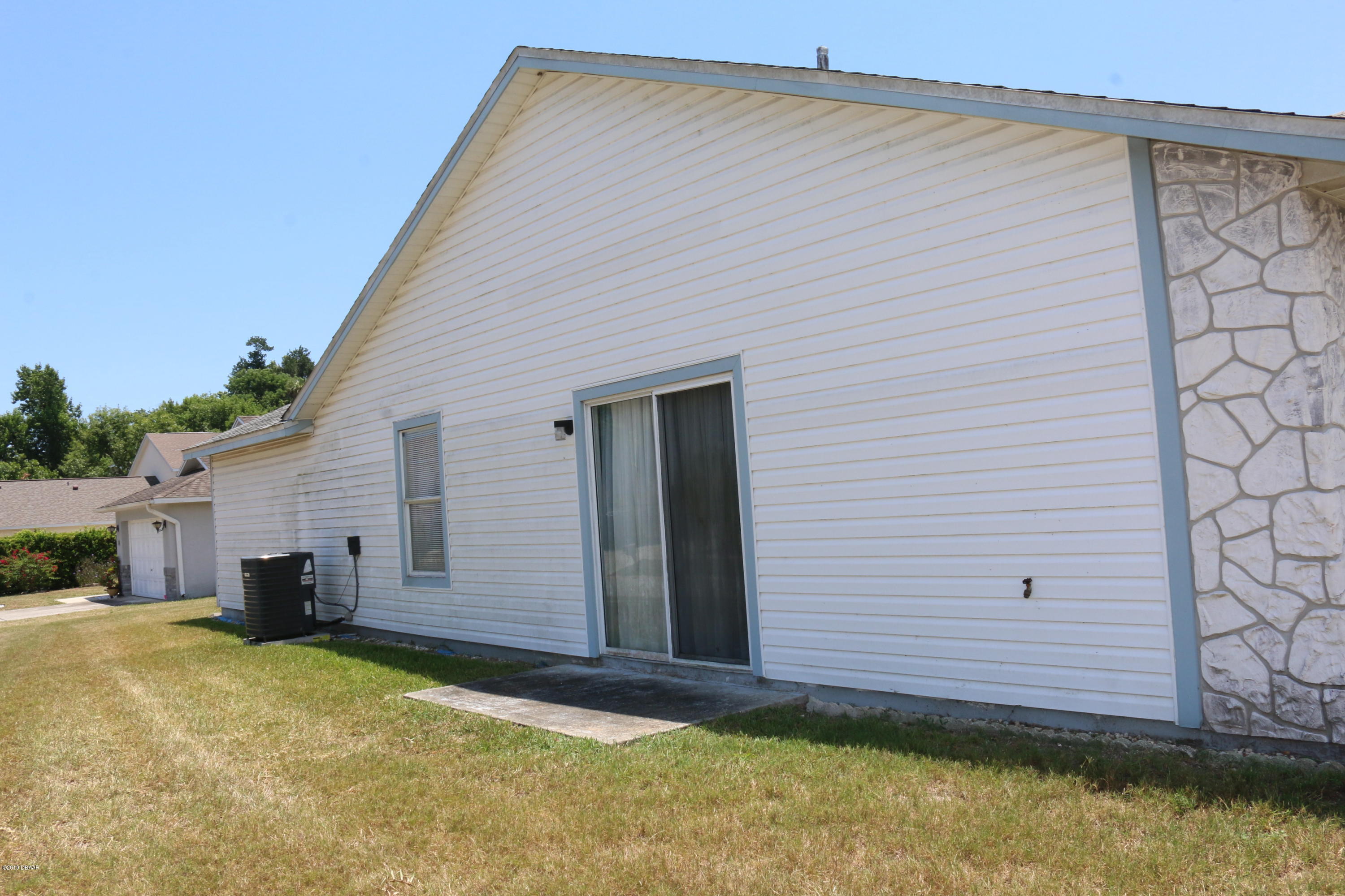 987 Deer Springs Road Port Orange, FL 32129 - Photo 29 of 34 Side Yard of Home