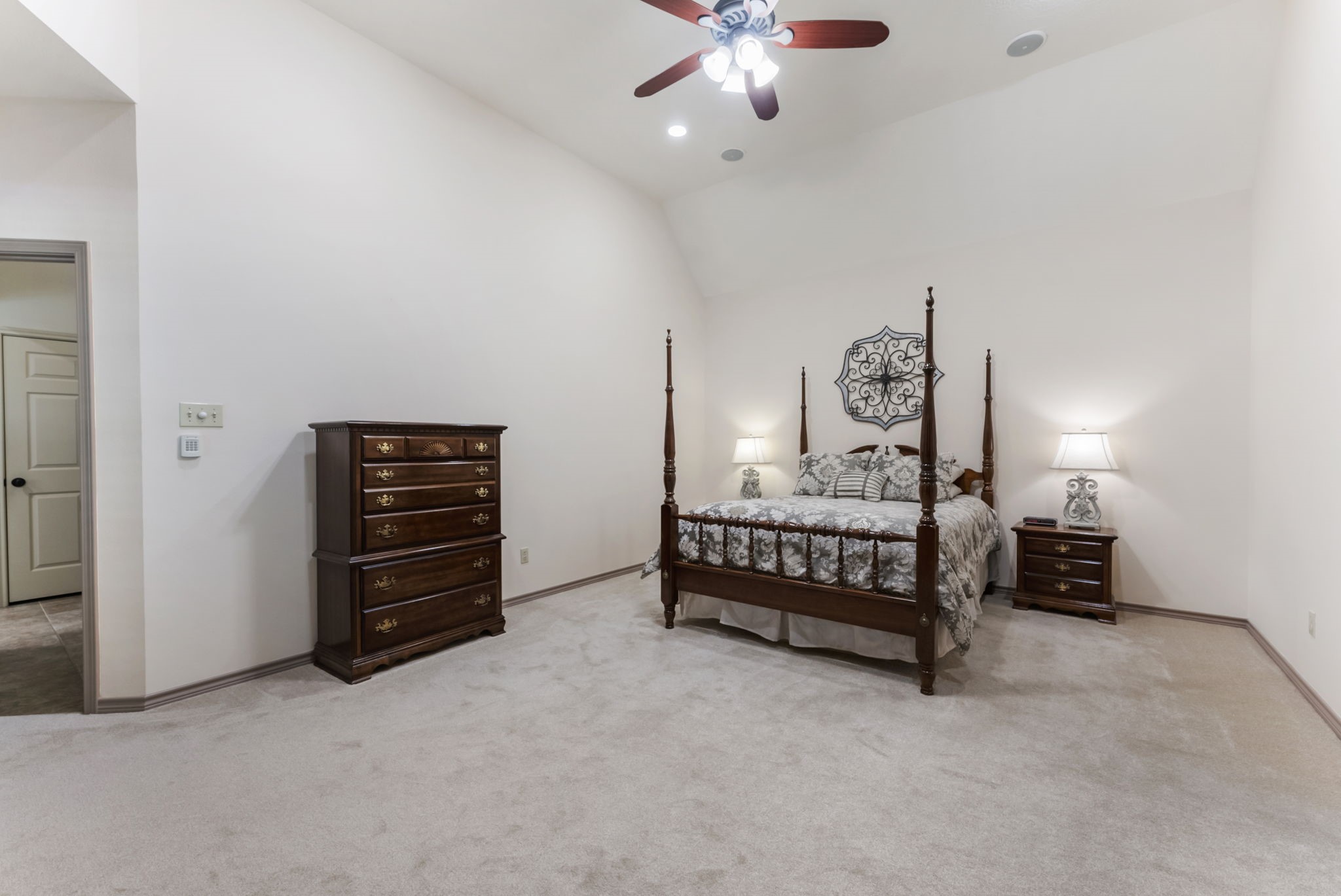 24311 Standing Oak Drive Spring, TX 77389 - Photo 28 of 42 Soft natural light with views of you back yard and neutral tones keep the space calm and inviting. Direct access to the bath makes daily routines seamless.