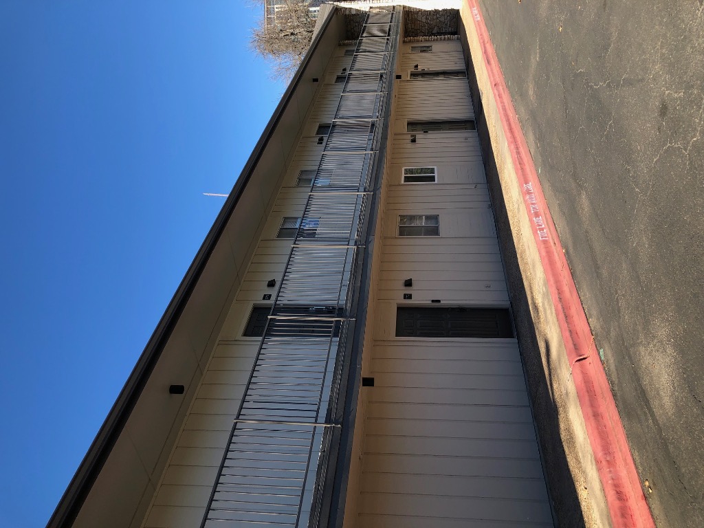 Undisclosed Address Austin, TX 78704 - Photo 1 of 7 a view of building with an outdoor space