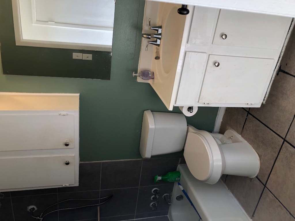 Undisclosed Address Austin, TX 78704 - Photo 5 of 7 a bathroom with a sink and a toilet