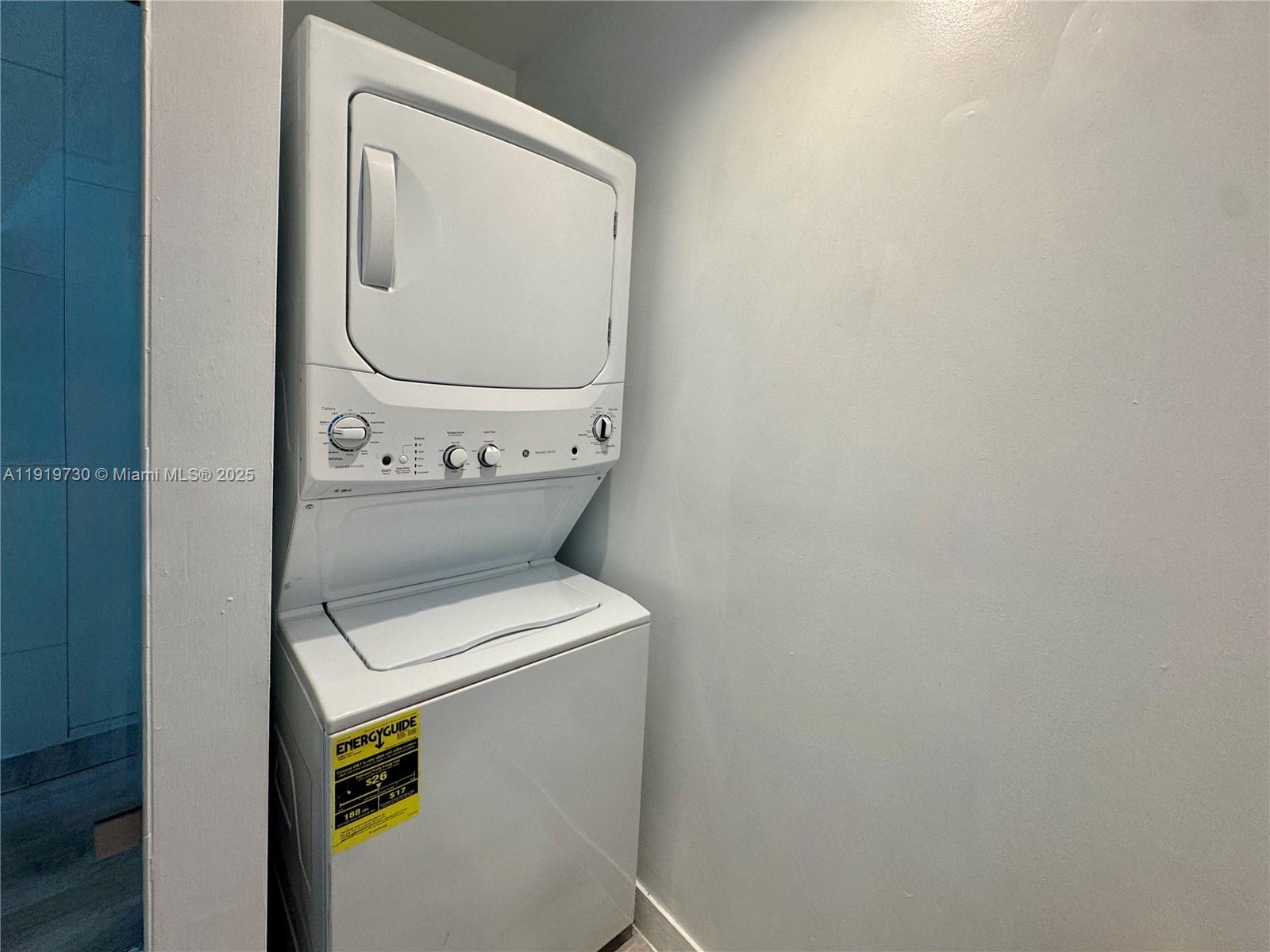 8101 Biscayne Boulevard, Unit R615 Miami, FL 33138 - Photo 18 of 27 a utility room with dryer and washer