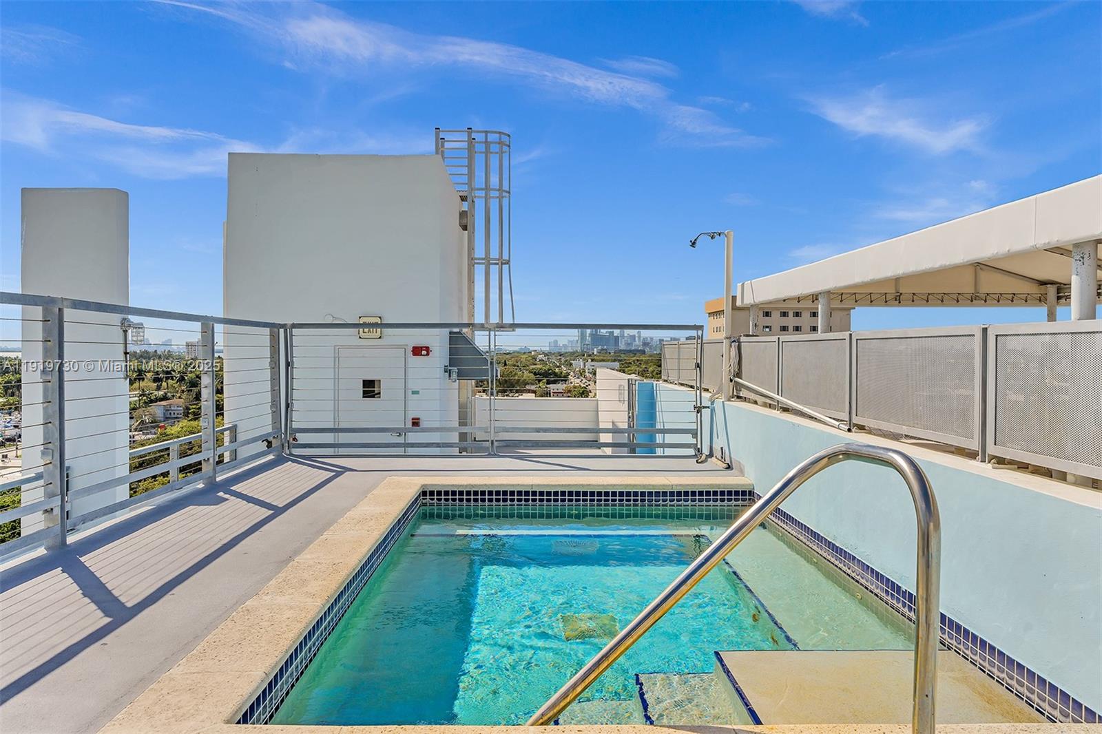 8101 Biscayne Boulevard, Unit R615 Miami, FL 33138 - Photo 19 of 27 a view of a balcony and car parked