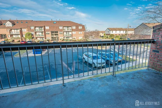 a view of a balcony with city view