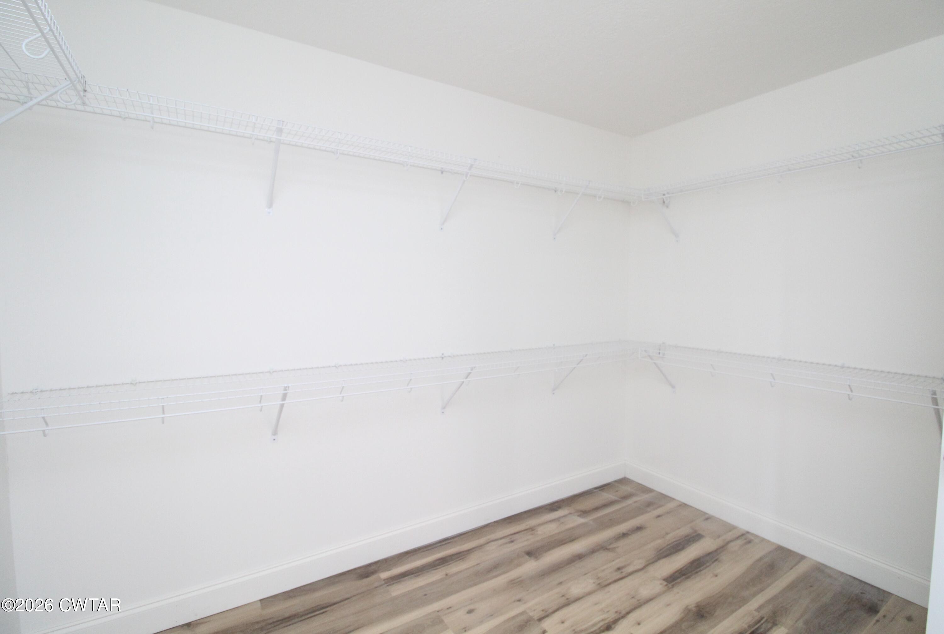 440 Oak Point Drive Lexington, TN 38351 - Photo 11 of 14 a view of a room with racks on the wall
