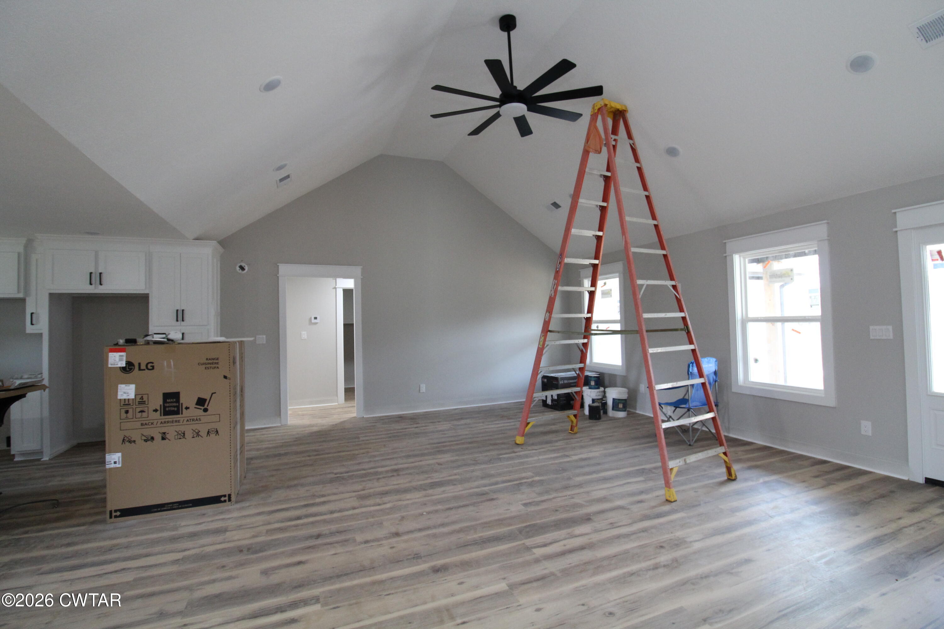 440 Oak Point Drive Lexington, TN 38351 - Photo 7 of 14 a view of empty room with wooden floor and window