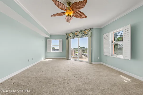 a view of a balcony with chairs