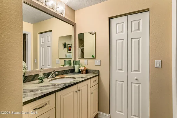 a view of a swimming pool with outdoor seating