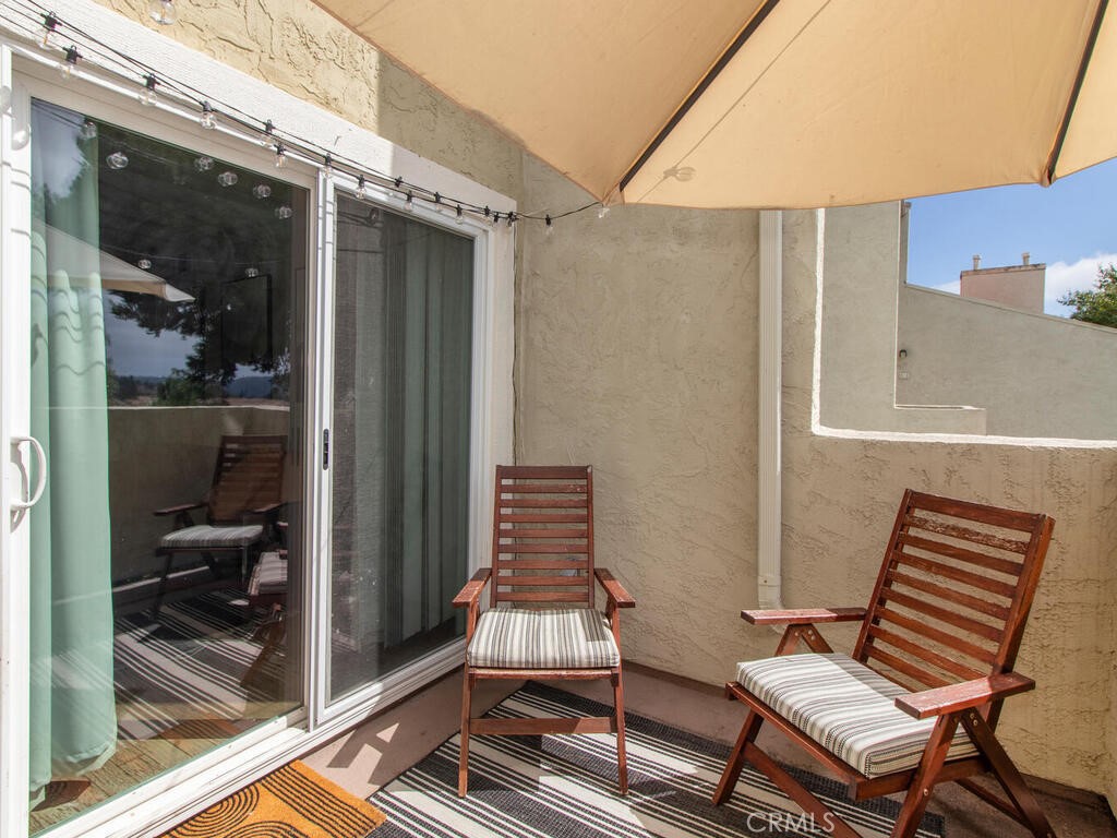 6907 Quail Place, Unit F Carlsbad, CA 92009 - Photo 13 of 24 a outdoor space with a couch