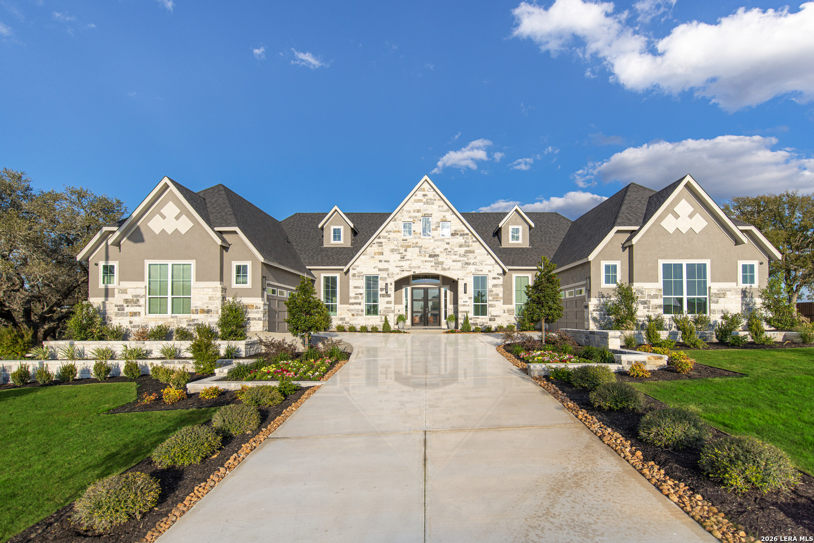 a view of house with yard and green space