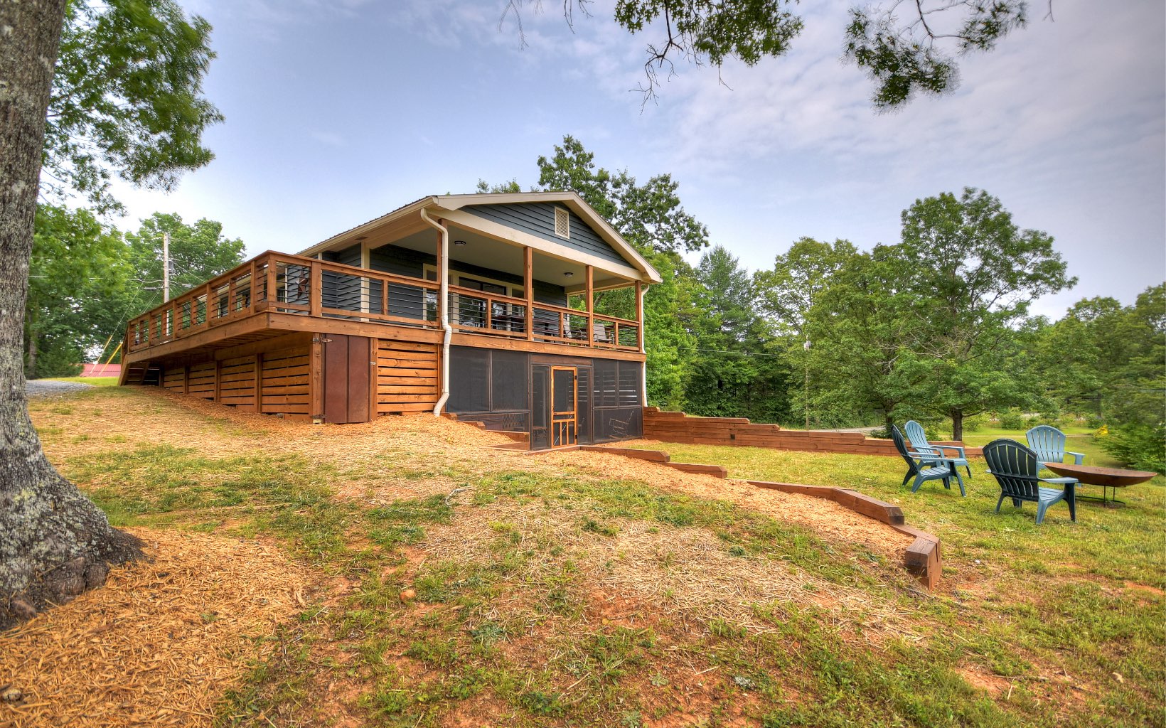 230 Old Ridge Road McCaysville, GA 30555 - Photo 1 of 1 a front view of a house with a yard