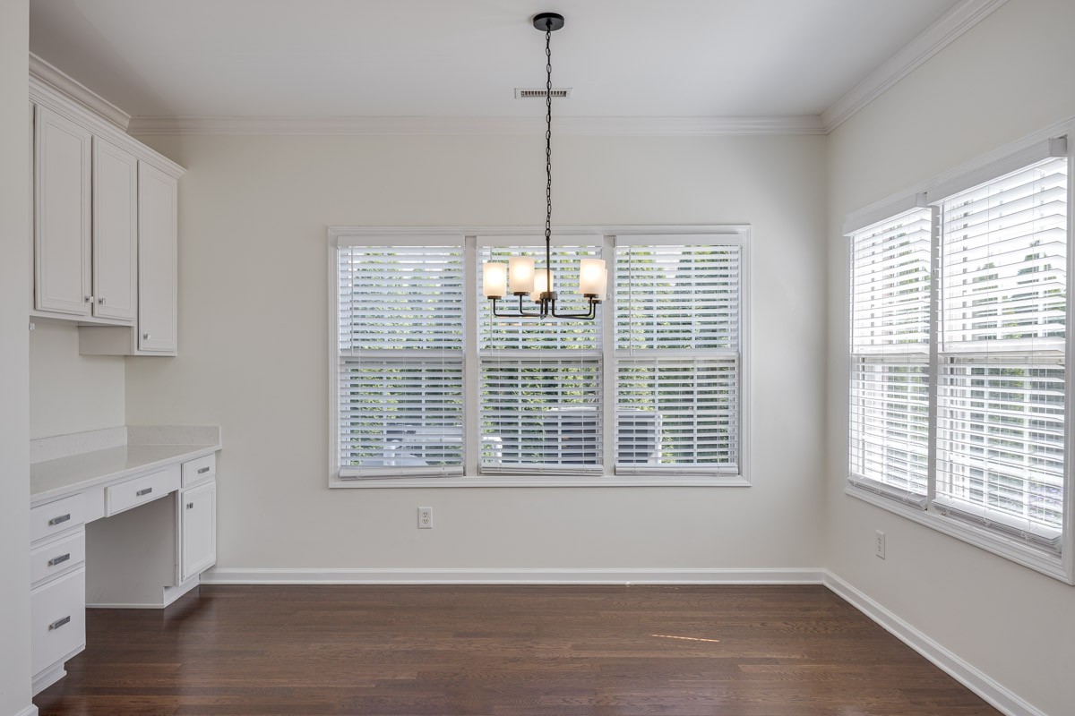 3002 Sakari Circle Spring Hill, TN 37174 - Photo 17 of 56 a view of an empty room with wooden floor and a window