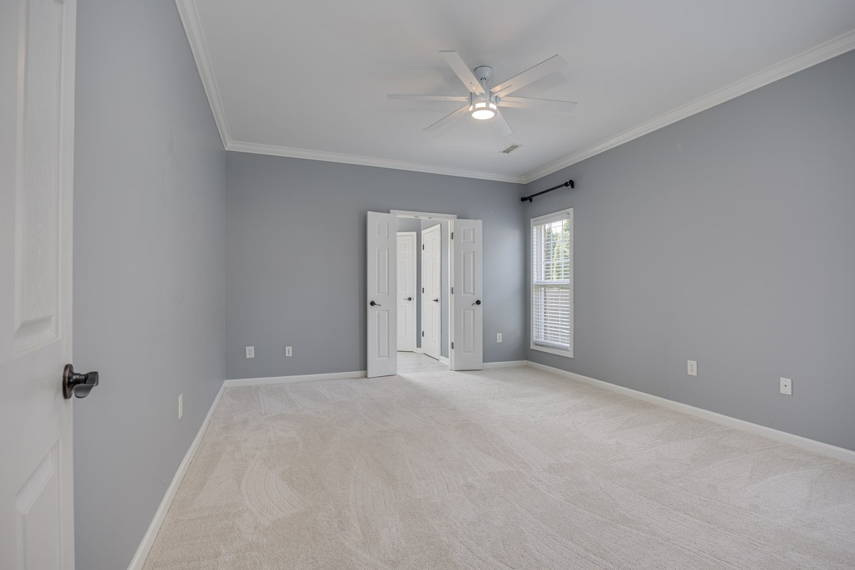 3002 Sakari Circle Spring Hill, TN 37174 - Photo 22 of 56 a view of an empty room with a ceiling fan