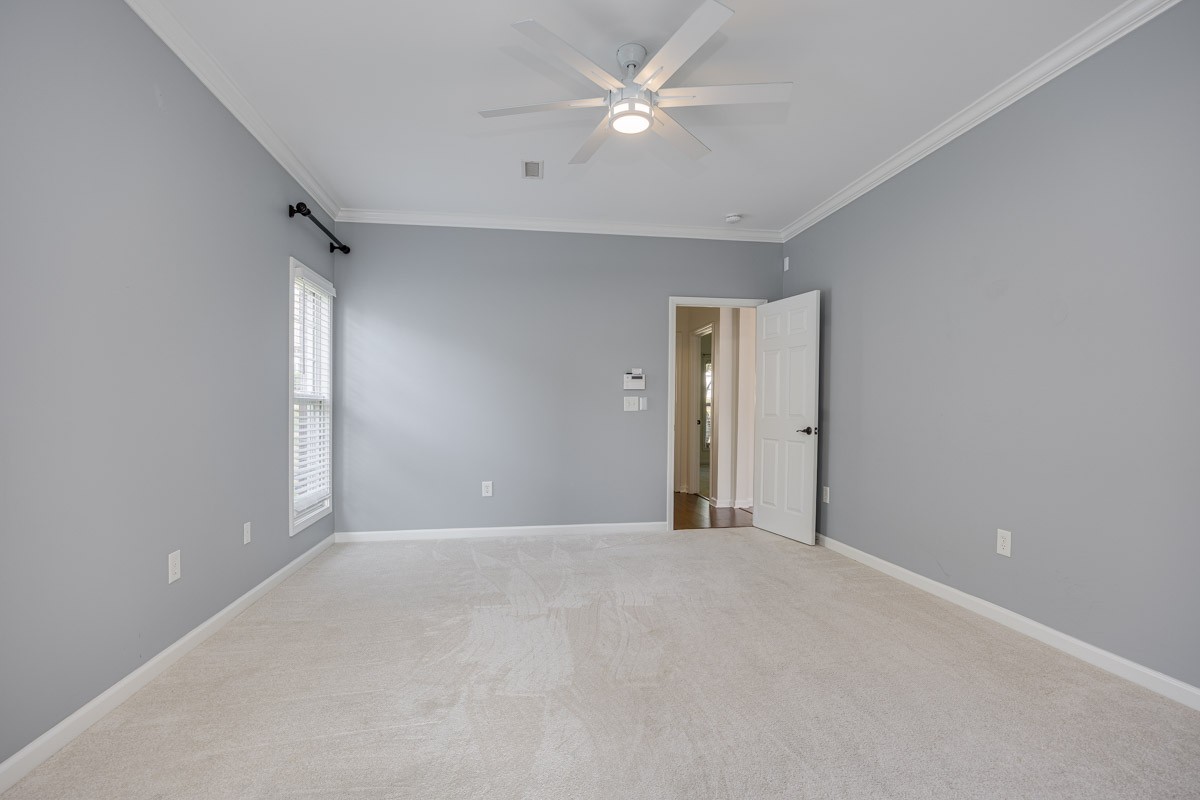 3002 Sakari Circle Spring Hill, TN 37174 - Photo 23 of 56 a view of an empty room with a ceiling fan