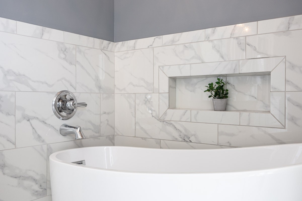 3002 Sakari Circle Spring Hill, TN 37174 - Photo 27 of 56 a bathroom with a bathtub