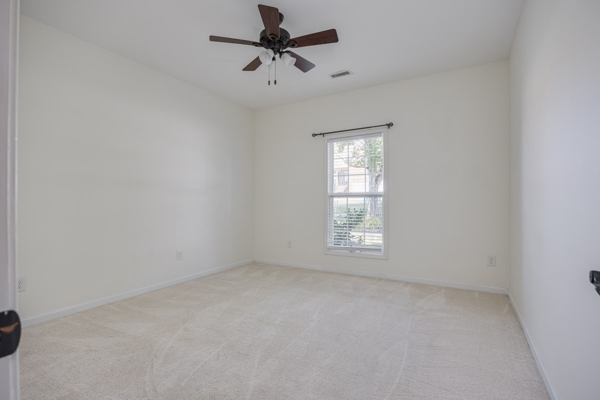 3002 Sakari Circle Spring Hill, TN 37174 - Photo 30 of 56 an empty room with windows and fan